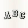 Przypinki do butów Jibbitz z literą „a”