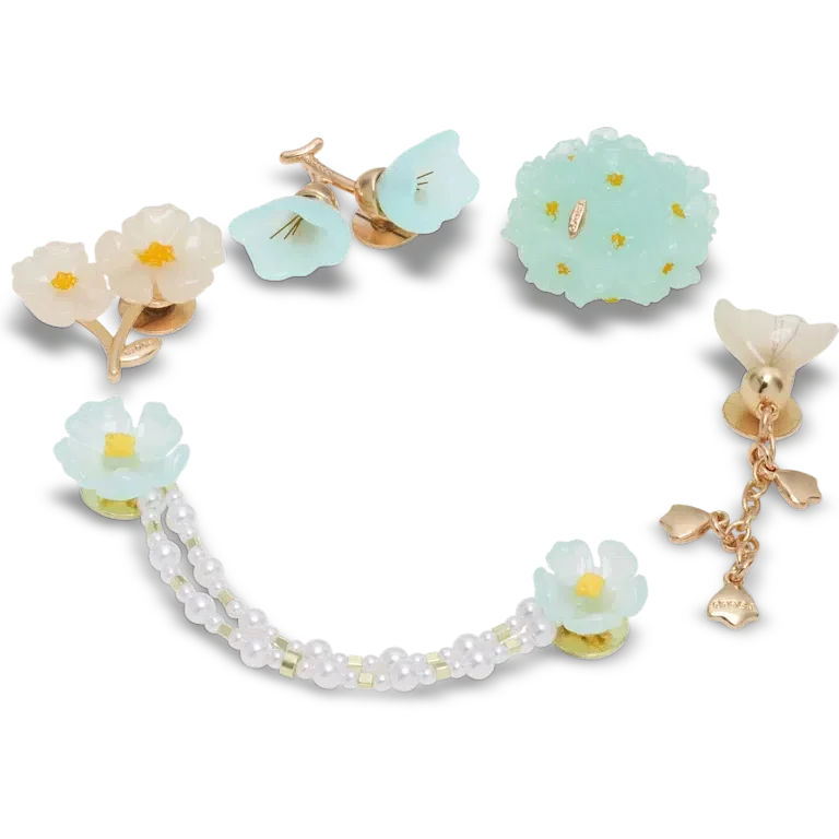 Przypinki Jibbitz™ „Blue Dainty Floral” – zestaw 5 sztuk Przypinki Jibbitz™ „Blue Dainty Floral” – zestaw 5 sztuk