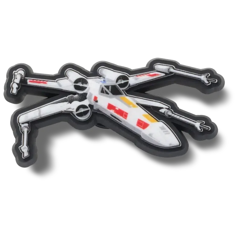 Przypinki Jibbitz™ „Myśliwiec X-Wing” z serii „Gwiezdne Wojny” Przypinki Jibbitz™ „Myśliwiec X-Wing” z serii „Gwiezdne Wojny”