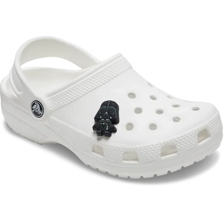 Przypinki Jibbitz™ z motywem Dartha Vadera z serii „Gwiezdne wojny” Przypinki Jibbitz™ z motywem Dartha Vadera z serii „Gwiezdne wojny”
