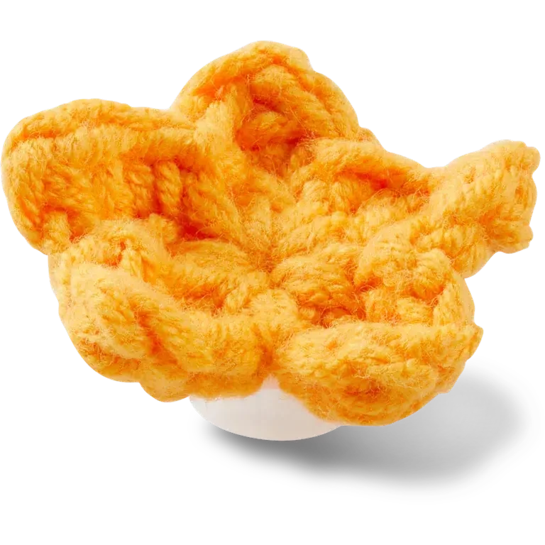 Ręcznie wykonane szydełkowe przypinki Jibbitz™ w kształcie pomarańczowej gwiazdy Ręcznie wykonane szydełkowe przypinki Jibbitz™ w kształcie pomarańczowej gwiazdy